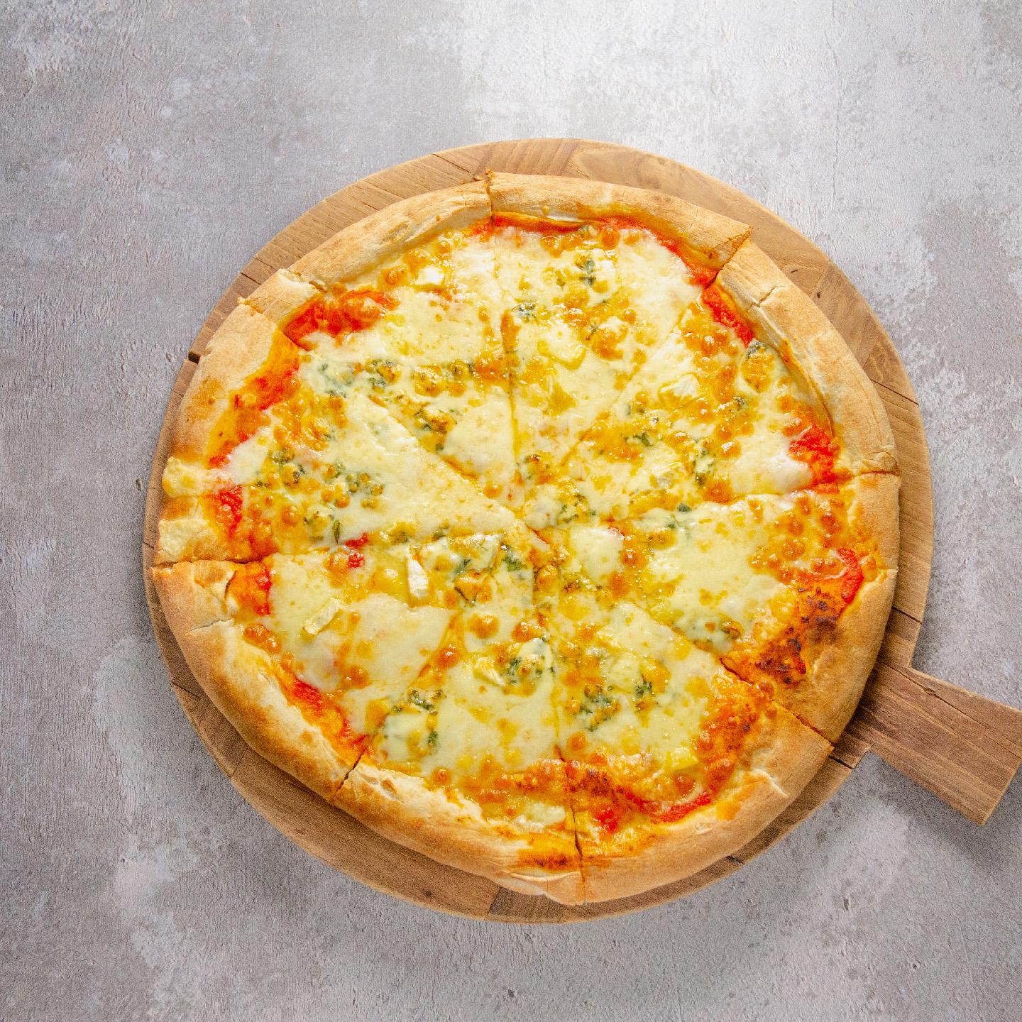 Photo of the dishFOUR CHEESE PIZZA